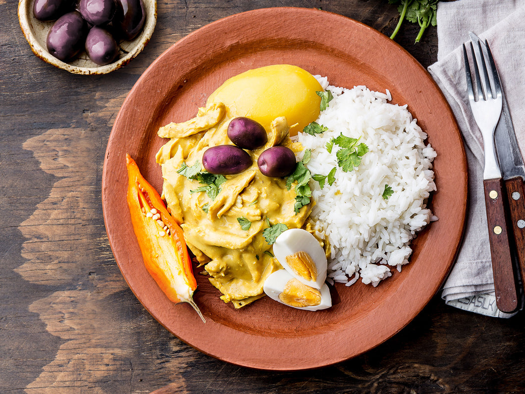 Peruvian Aji De Gallina (Shredded Chicken in a Cheesy Sauce) with Rice