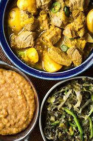 Ethiopian Sega Wat, *Kik Alicha and Gomen Wat with couscous (traditionally eaten with fermented bread Injera)