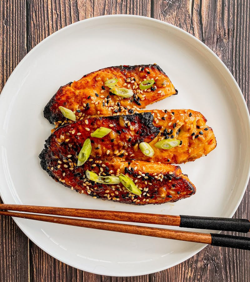 Miso glazed fish (tilapia) with sushi rice and cabbage and carrot slaw dressed with wasabi miso dressing